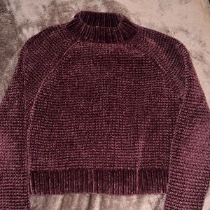 Burgundy red sweater/shirt, worn once maybe not even. Has a small hole by tag.